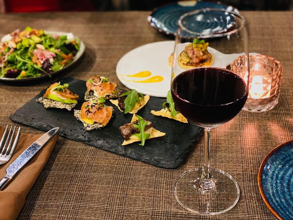 Enjoy authentic European dishes in the romantic space of Pincho Tapas Kitchen & Drinks 21