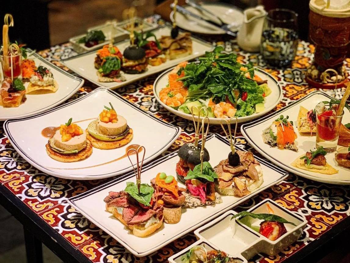 Enjoy authentic European dishes in the romantic space of Pincho Tapas Kitchen & Drinks 33