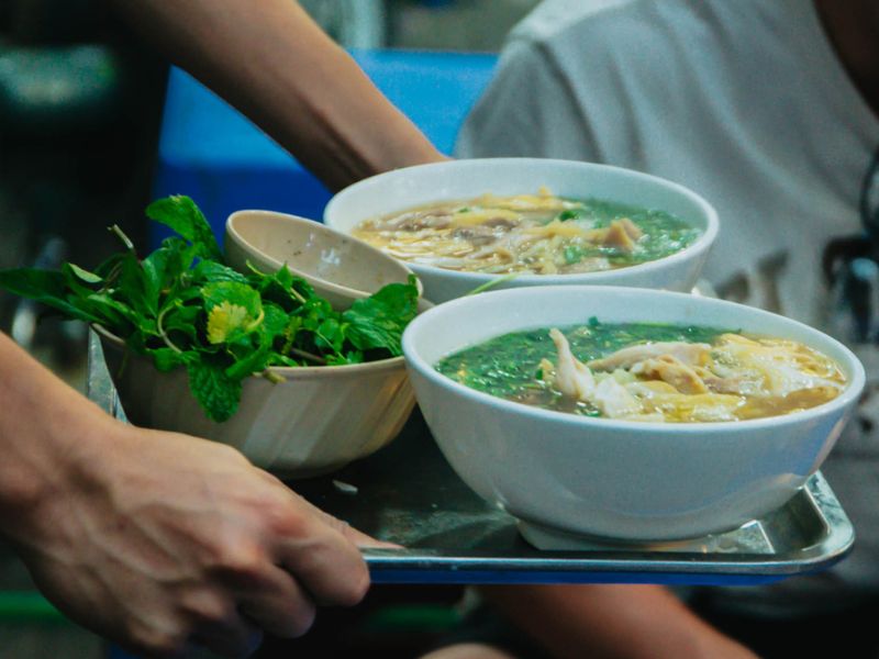 Visit Cau Go vermicelli restaurant and enjoy Hanoi specialties 10