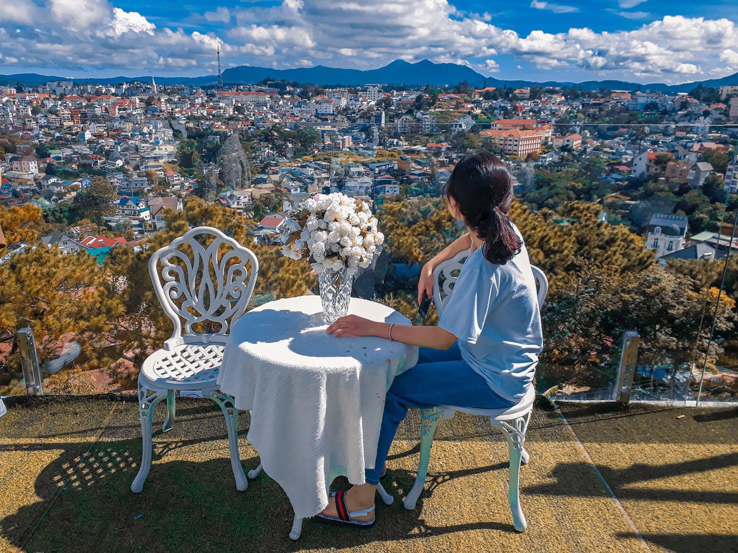 The whole dreamy city seems to be shrunk to a Da Lat Golf Coffee shop with a great view 9