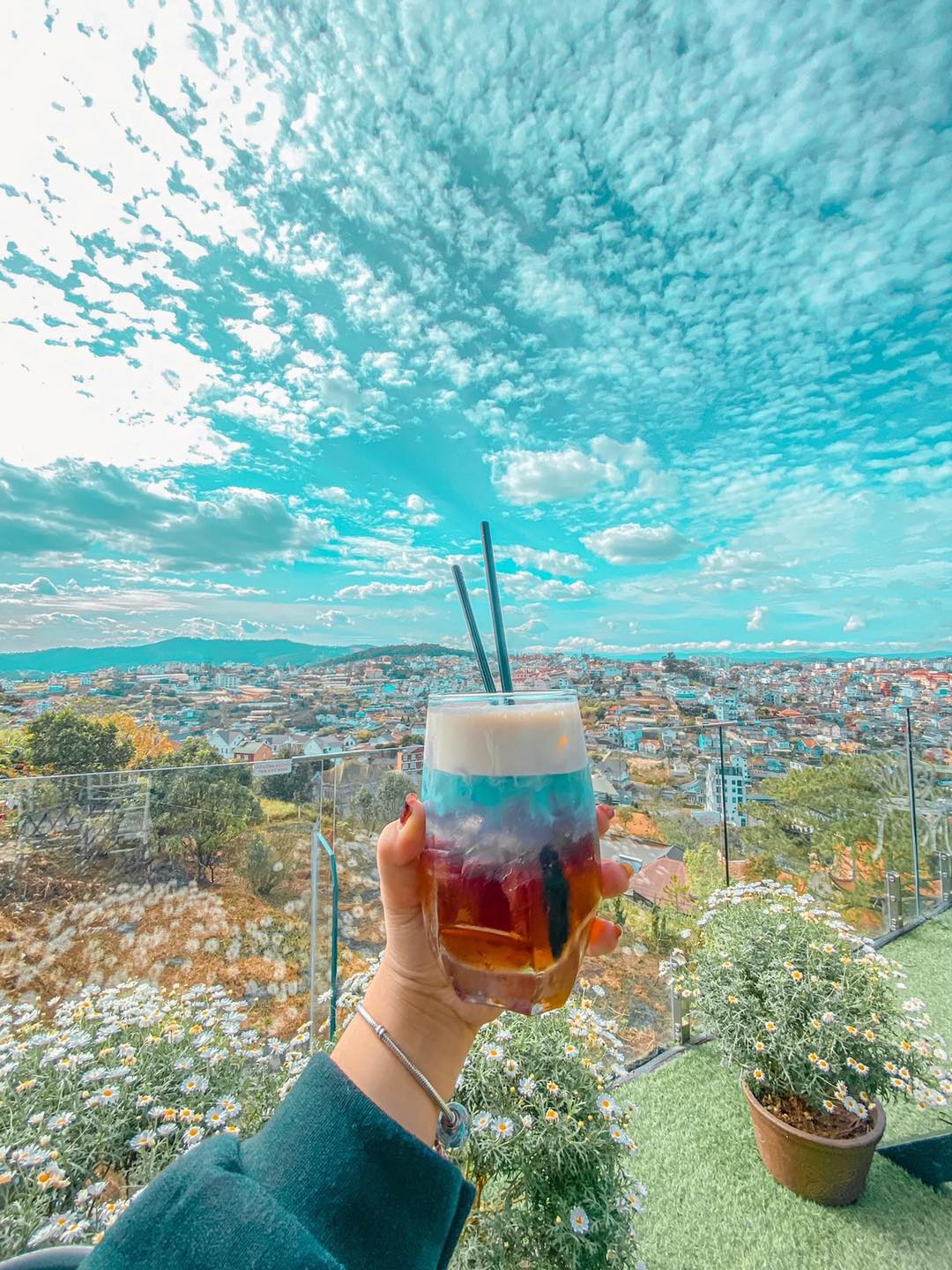 The whole dreamy city seems to be reduced to a Da Lat Golf Coffee shop with a very good view