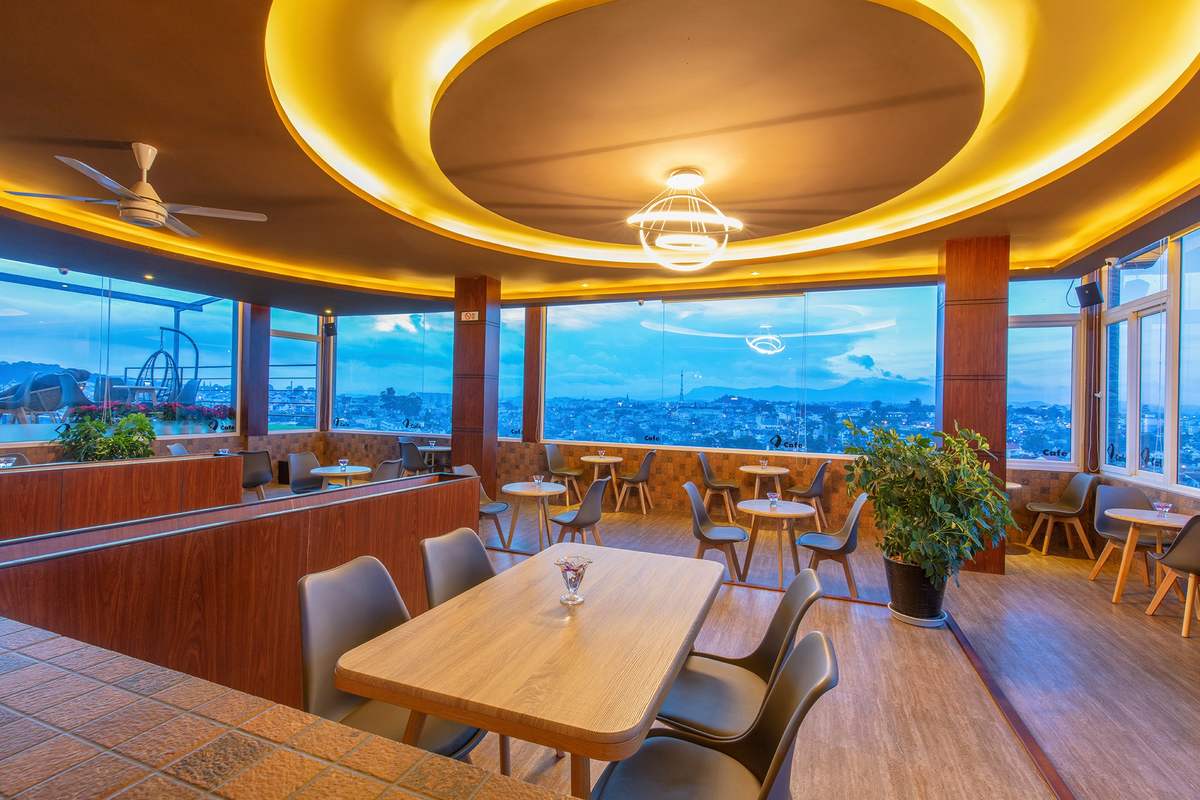 The whole dreamy city seems to be reduced to a Da Lat Golf Coffee shop with a great view 3