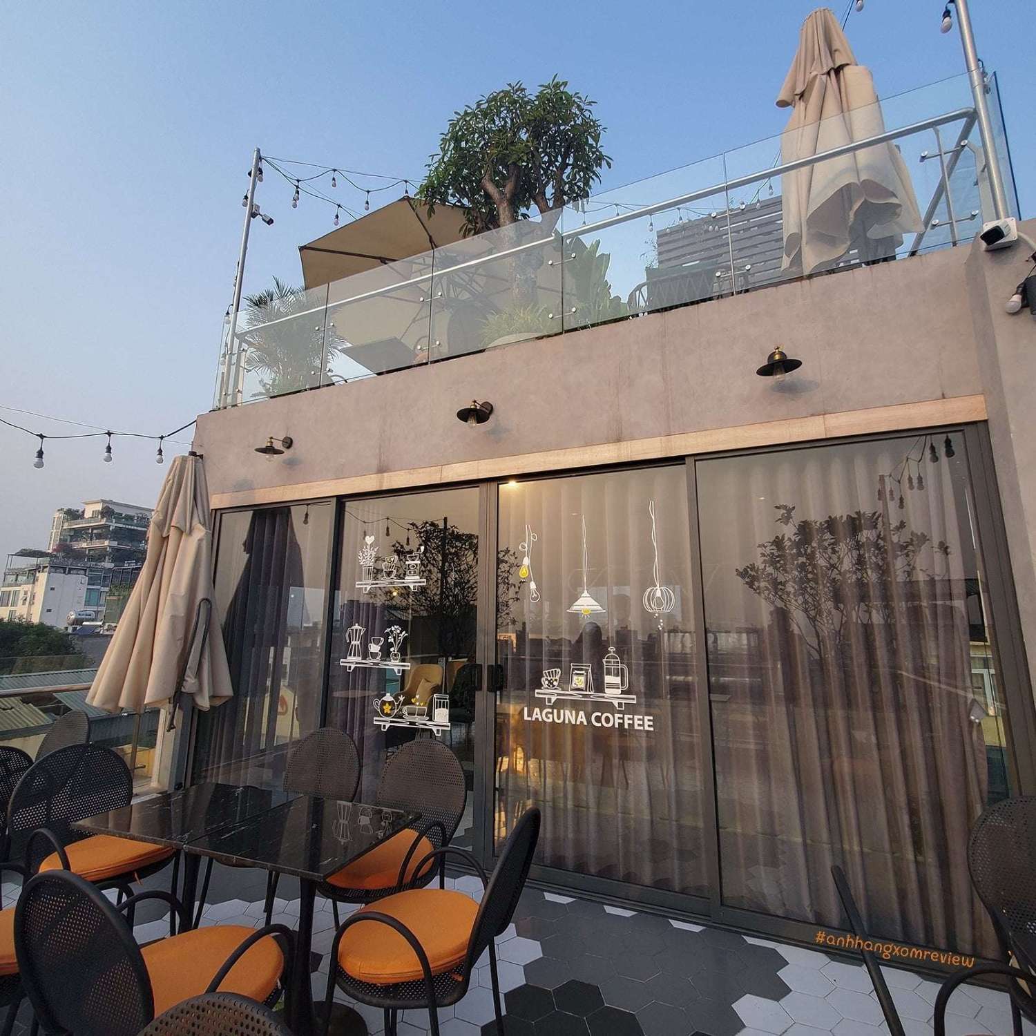Watch the sunset across West Lake at Laguna Rooftop Hanoi 2