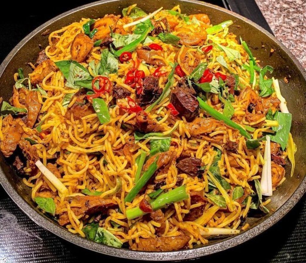 Stir-fried tail knob with turmeric and fish with bamboo shoots - Hue specialties in the rainy season 6