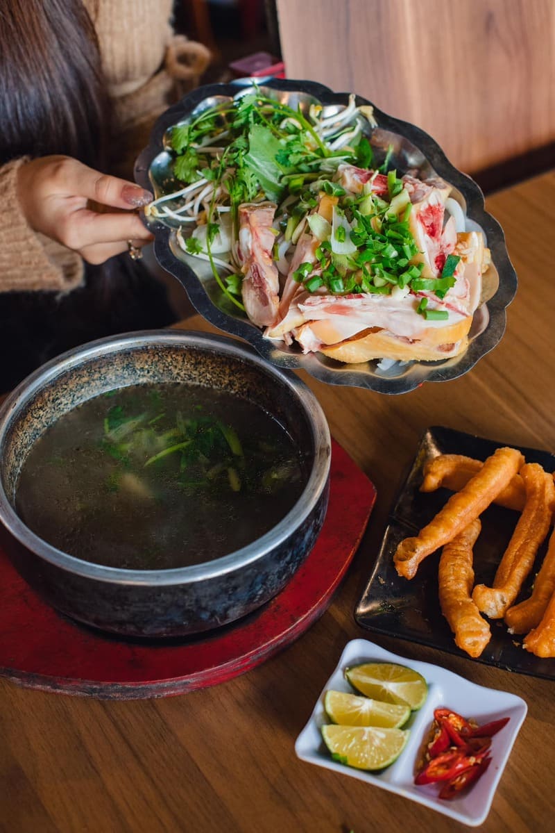 Top 4 stone bowl pho restaurants in Da Lat with unique cooking styles 7
