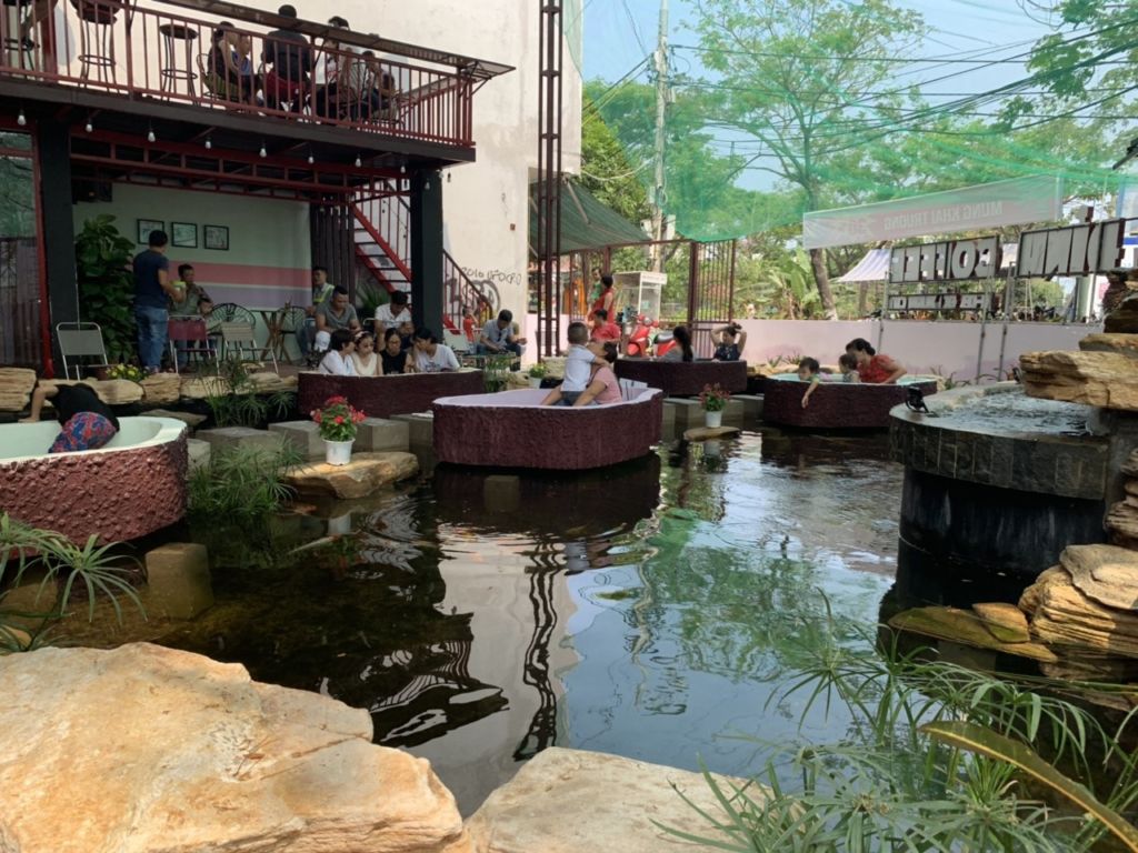 Leisurely stop by Dung Dinh Coffee to see the super quality Koi fish pond 3
