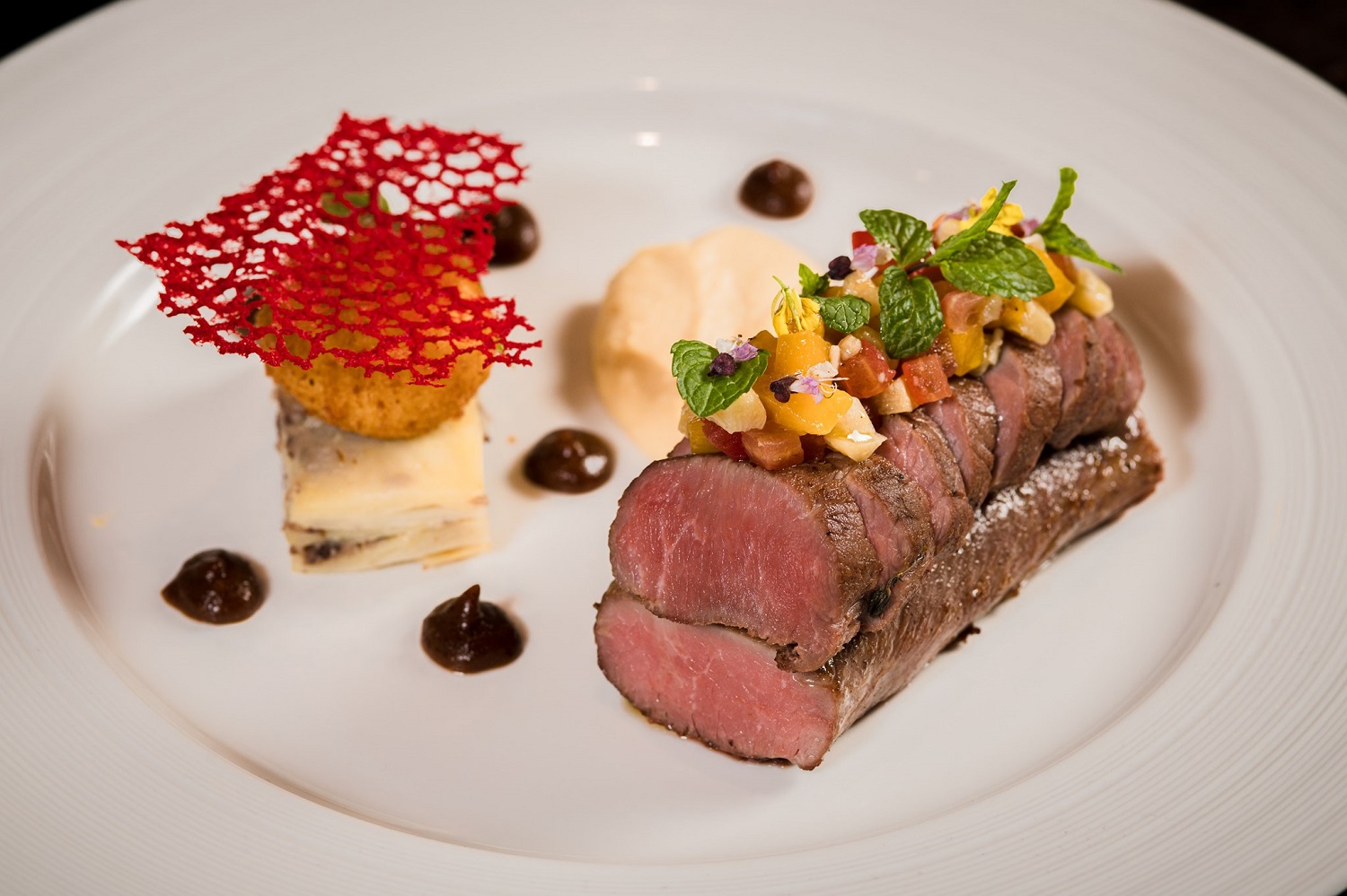 Experience unique cuisine in a luxurious, modern space at Grill 63 20