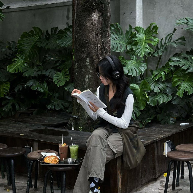 Enjoy a cafe, explore the cafe with a giant wall of books 4