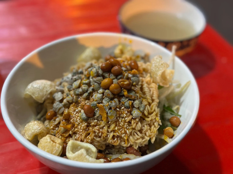 Top 10 delicious mussel rice shops in the heart of Saigon 2